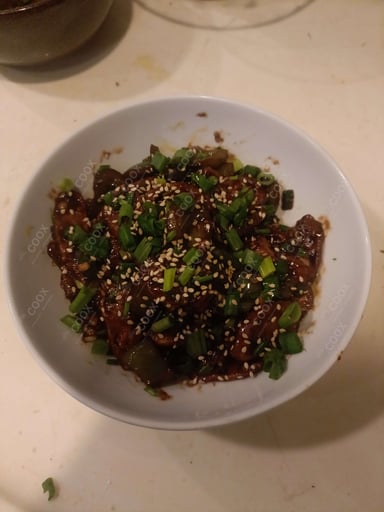 Tasty Chilli Lotus Stem cooked by COOX chefs cooks during occasions parties events at home