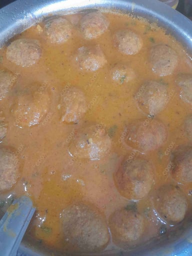 Tasty Arbi Kofta cooked by COOX chefs cooks during occasions parties events at home