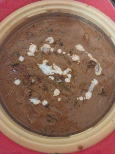 Tasty Mushroom do Pyaza cooked by COOX chefs cooks during occasions parties events at home