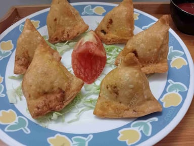 Tasty Keema Samosas cooked by COOX chefs cooks during occasions parties events at home