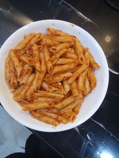 Tasty Pasta in Red Sauce cooked by COOX chefs cooks during occasions parties events at home