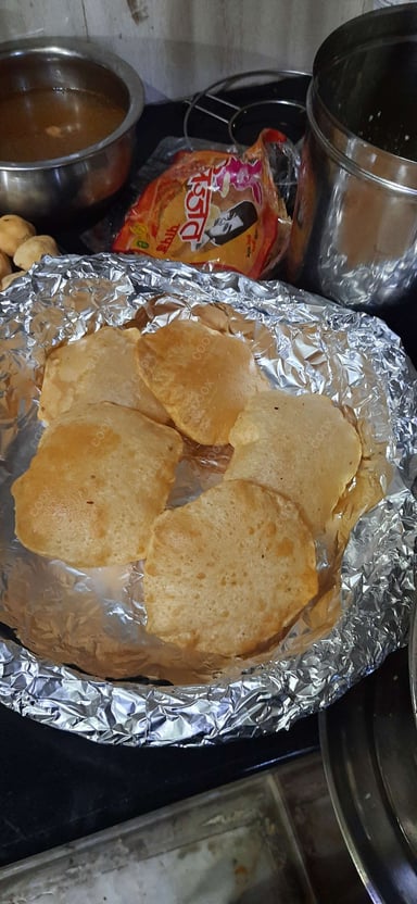 Tasty Pooris & Bedmis cooked by COOX chefs cooks during occasions parties events at home