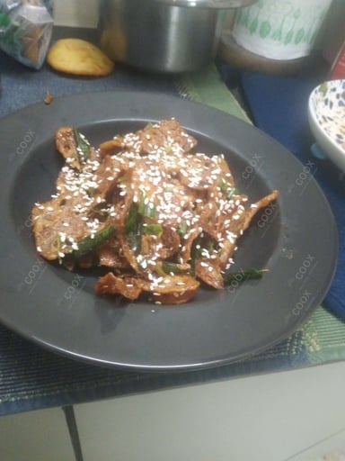 Tasty Chilli Lotus Stem cooked by COOX chefs cooks during occasions parties events at home