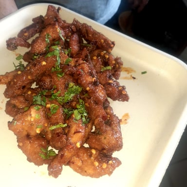 Tasty Pepper Chicken cooked by COOX chefs cooks during occasions parties events at home
