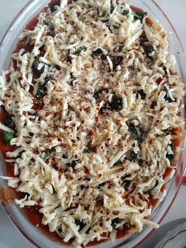 Tasty Chicken Lasagna cooked by COOX chefs cooks during occasions parties events at home