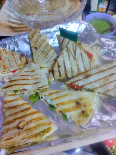 Tasty Veg Quesadillas cooked by COOX chefs cooks during occasions parties events at home