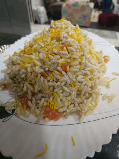 Tasty Bhel Puri cooked by COOX chefs cooks during occasions parties events at home