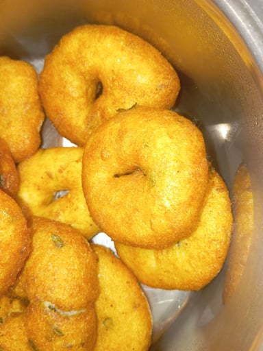 Tasty Medu Vada cooked by COOX chefs cooks during occasions parties events at home