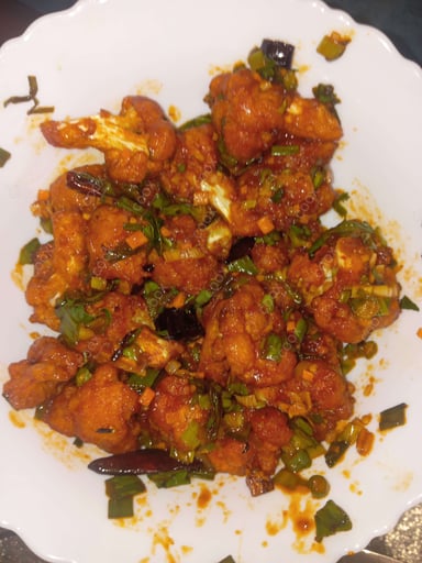 Tasty Gobhi 65 cooked by COOX chefs cooks during occasions parties events at home