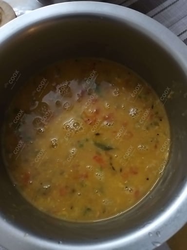 Tasty Urad Dal cooked by COOX chefs cooks during occasions parties events at home