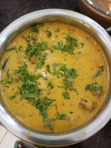 Tasty Kadhi cooked by COOX chefs cooks during occasions parties events at home