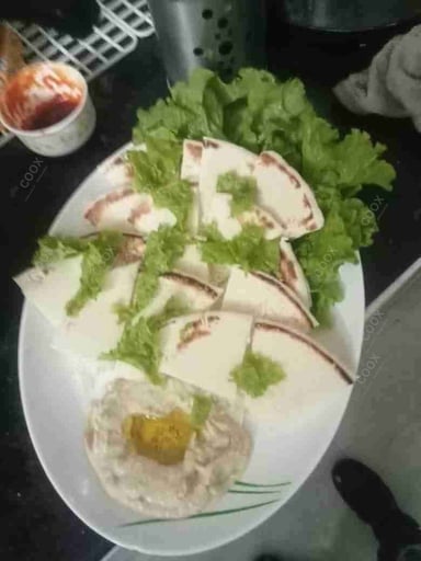 Tasty Hummus Dip cooked by COOX chefs cooks during occasions parties events at home