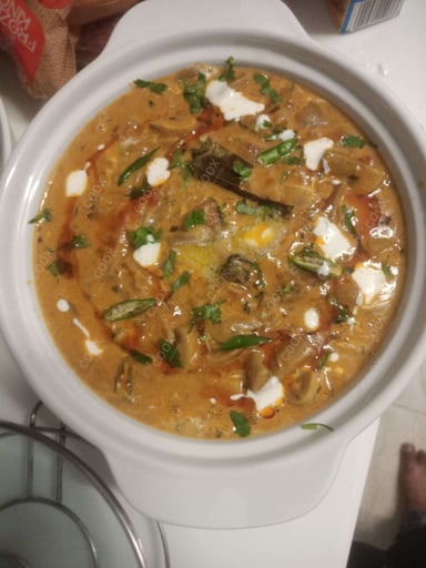 Tasty Mushroom do Pyaza cooked by COOX chefs cooks during occasions parties events at home