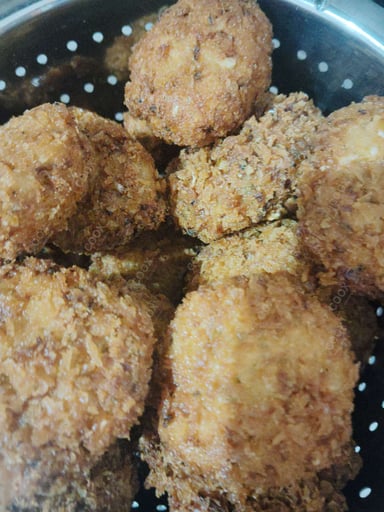 Tasty Aloo Bonda cooked by COOX chefs cooks during occasions parties events at home