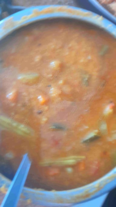 Tasty Sambhar cooked by COOX chefs cooks during occasions parties events at home