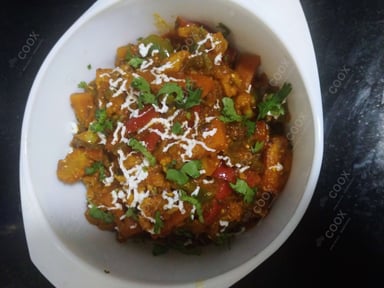 Tasty Veg Jalfrezi cooked by COOX chefs cooks during occasions parties events at home