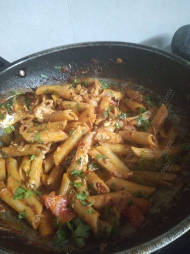 Tasty Pasta in Red Sauce cooked by COOX chefs cooks during occasions parties events at home