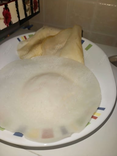Tasty Appam cooked by COOX chefs cooks during occasions parties events at home
