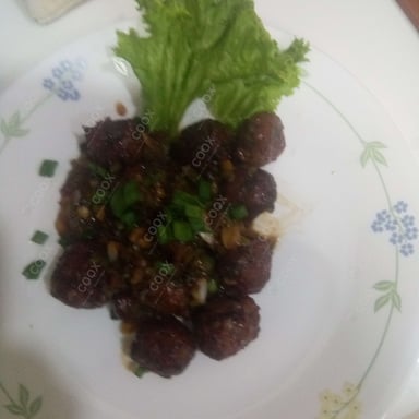Tasty Veg Manchurian (Dry) cooked by COOX chefs cooks during occasions parties events at home