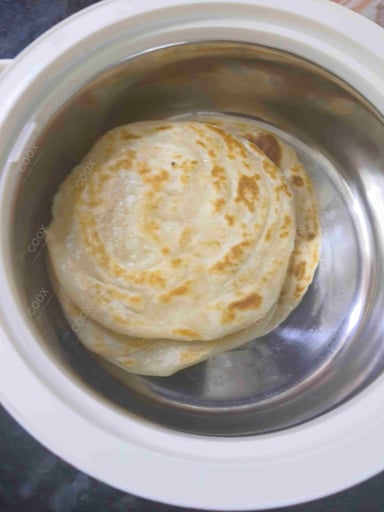 Tasty Puran Poli cooked by COOX chefs cooks during occasions parties events at home