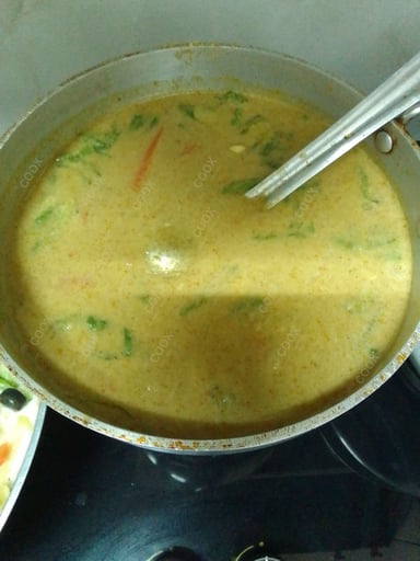 Tasty Green Thai Curry cooked by COOX chefs cooks during occasions parties events at home