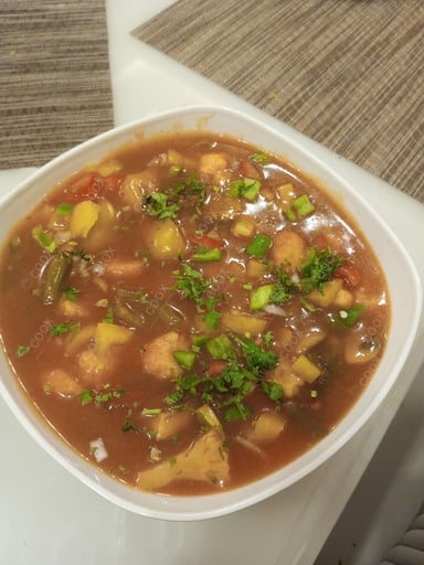 Tasty Mix Veg in Schezwan Sauce cooked by COOX chefs cooks during occasions parties events at home