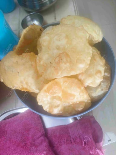 Tasty Chana Bhatura cooked by COOX chefs cooks during occasions parties events at home
