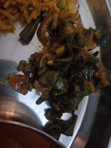 Tasty Bhindi cooked by COOX chefs cooks during occasions parties events at home