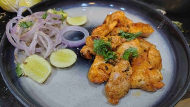 Tasty Chicken Tikka cooked by COOX chefs cooks during occasions parties events at home