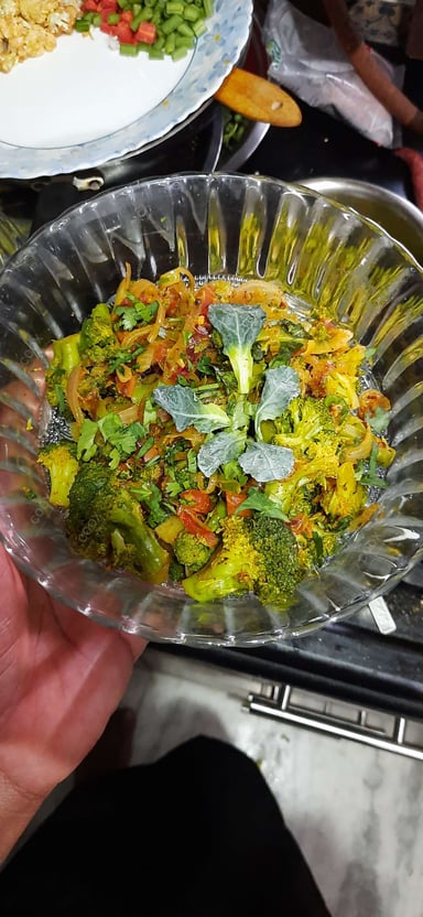 Tasty Masala Broccoli cooked by COOX chefs cooks during occasions parties events at home