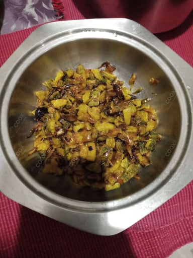 Tasty Karele ki Sabzi cooked by COOX chefs cooks during occasions parties events at home