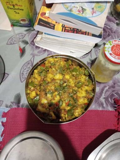 Tasty Aloo Shimla Mirch cooked by COOX chefs cooks during occasions parties events at home