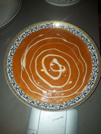 Tasty Malai Kofta (Orange Gravy) cooked by COOX chefs cooks during occasions parties events at home