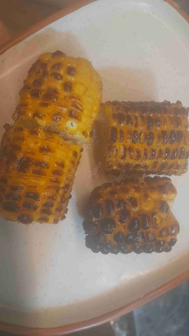 Tasty Grilled Corn cooked by COOX chefs cooks during occasions parties events at home