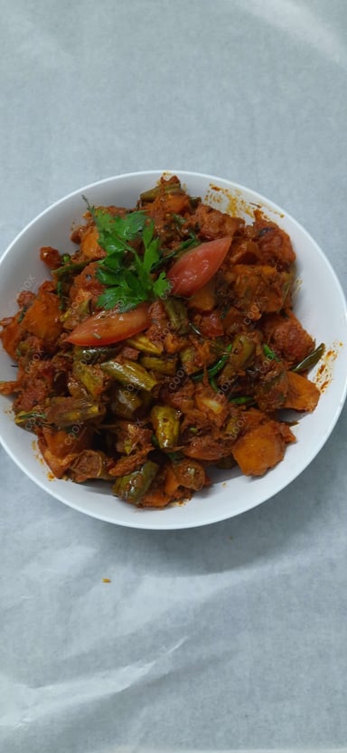 Tasty Aloo Parwal cooked by COOX chefs cooks during occasions parties events at home