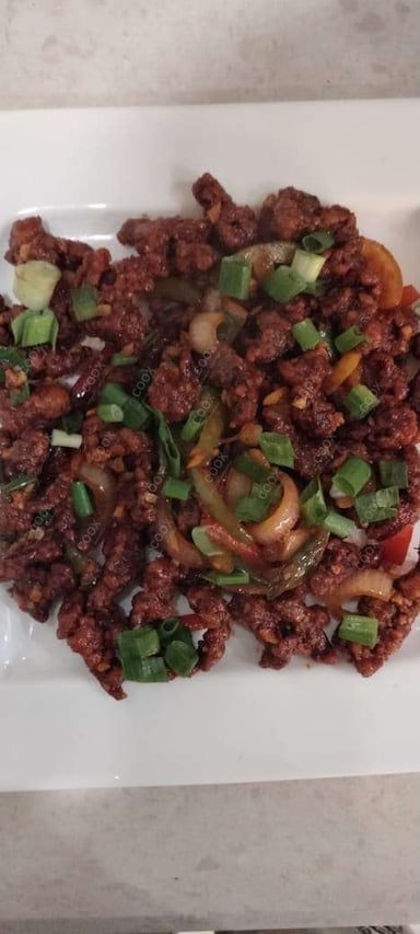 Tasty Crispy Chilli Lamb cooked by COOX chefs cooks during occasions parties events at home