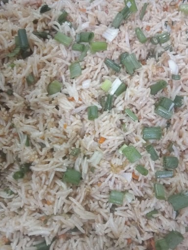 Tasty Burnt Garlic Rice cooked by COOX chefs cooks during occasions parties events at home