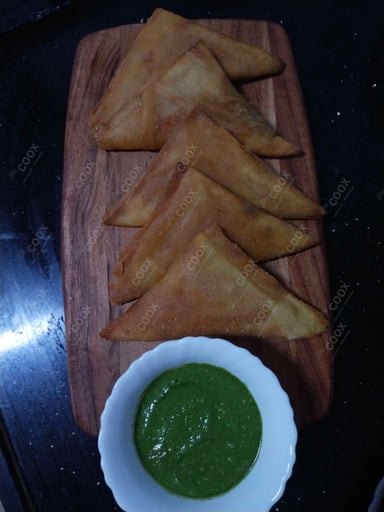Tasty Keema Samosas cooked by COOX chefs cooks during occasions parties events at home