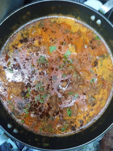 Tasty Mutton Korma cooked by COOX chefs cooks during occasions parties events at home
