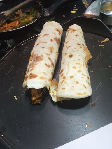 Tasty Chicken Kathi Rolls cooked by COOX chefs cooks during occasions parties events at home