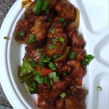 Tasty Chilli  Chicken cooked by COOX chefs cooks during occasions parties events at home