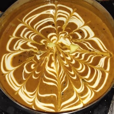 Tasty Dal Makhni cooked by COOX chefs cooks during occasions parties events at home