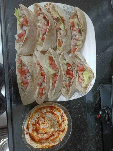 Tasty Hummus Dip cooked by COOX chefs cooks during occasions parties events at home