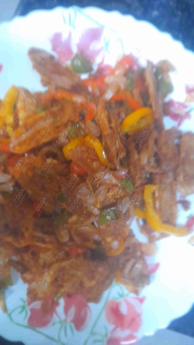 Tasty Chilli Lotus Stem cooked by COOX chefs cooks during occasions parties events at home