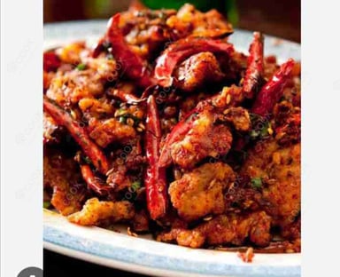 Tasty Crispy Chilli Lamb cooked by COOX chefs cooks during occasions parties events at home