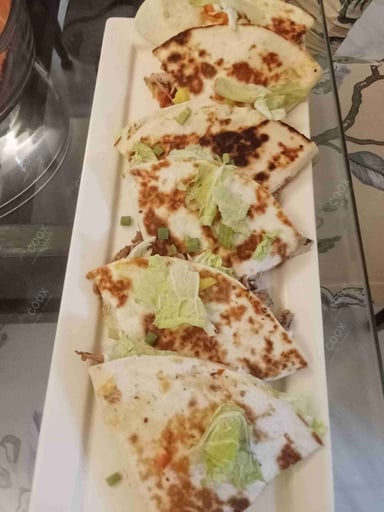 Tasty Chicken Quesadillas cooked by COOX chefs cooks during occasions parties events at home