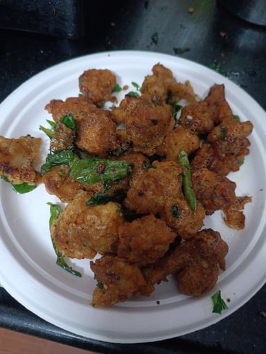 Tasty Gobhi 65 cooked by COOX chefs cooks during occasions parties events at home