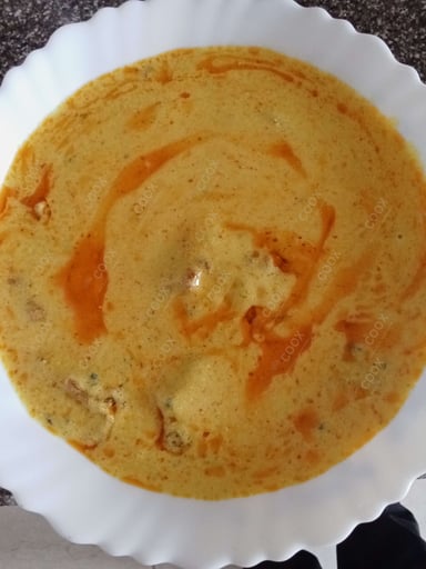 Tasty Kadhi cooked by COOX chefs cooks during occasions parties events at home