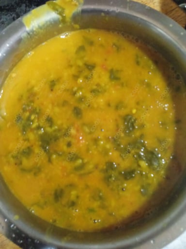 Tasty Palak Dal cooked by COOX chefs cooks during occasions parties events at home