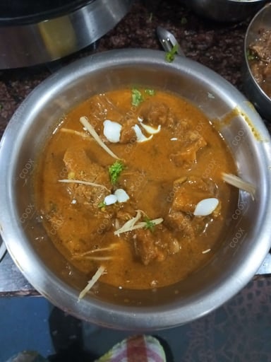 Tasty Mutton Korma cooked by COOX chefs cooks during occasions parties events at home